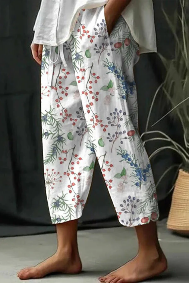 Damesbroek met unieke print en zakken met knoopsluiting