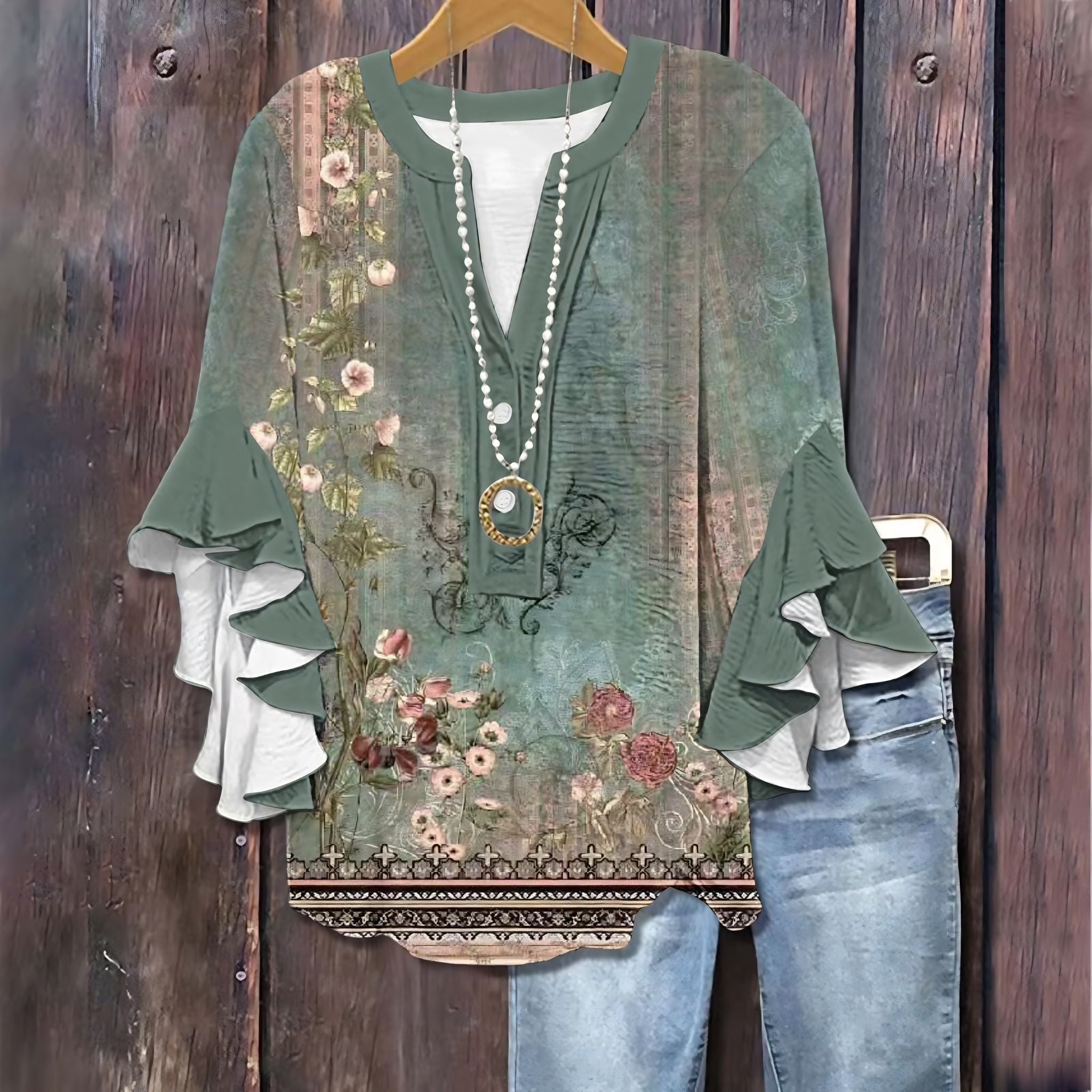 Dames T-shirt met bloemenprint en ruches aan de zoom. 1
