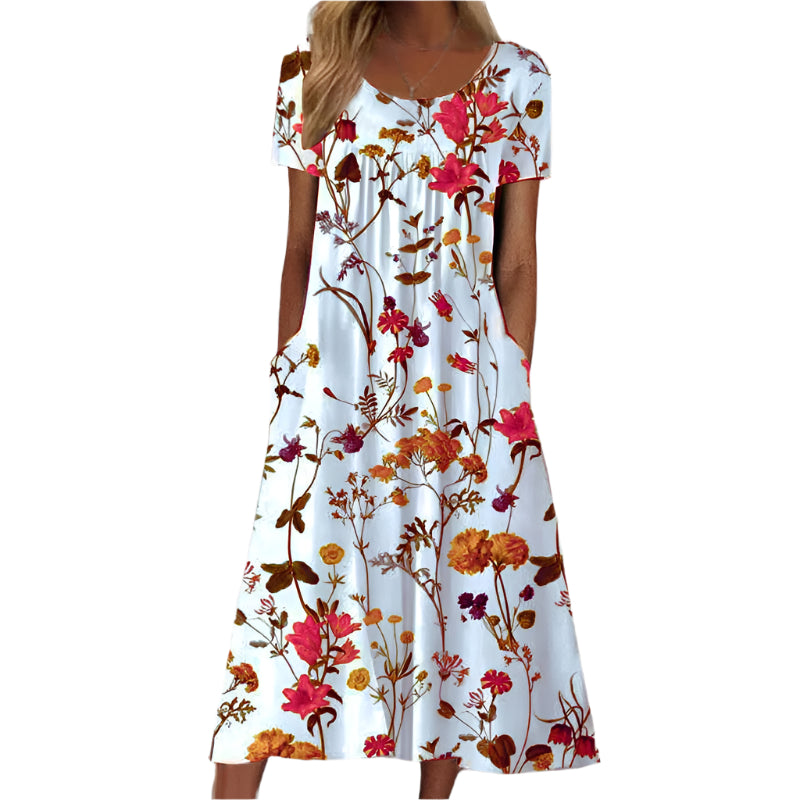 Damesjurk met bloemenpatroon en stijlvol design.