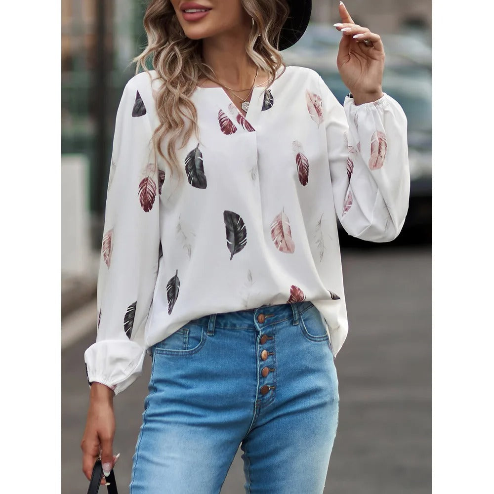 Chiffon blouse met verenpatroon