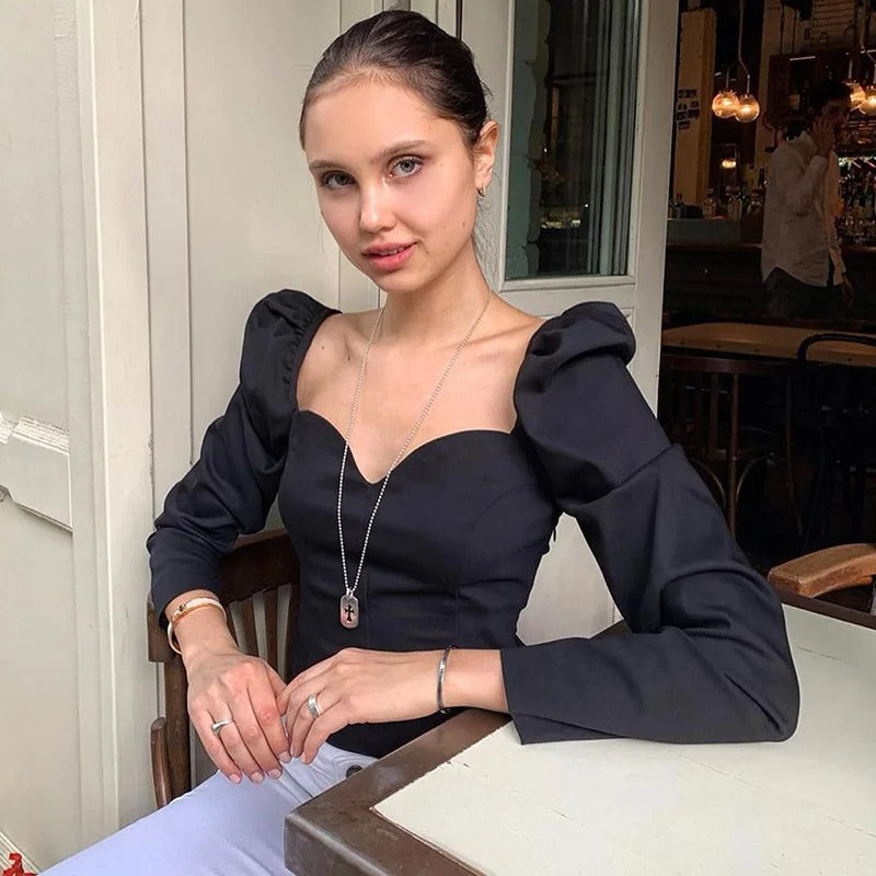 Slanke damesblouse met pofmouwen