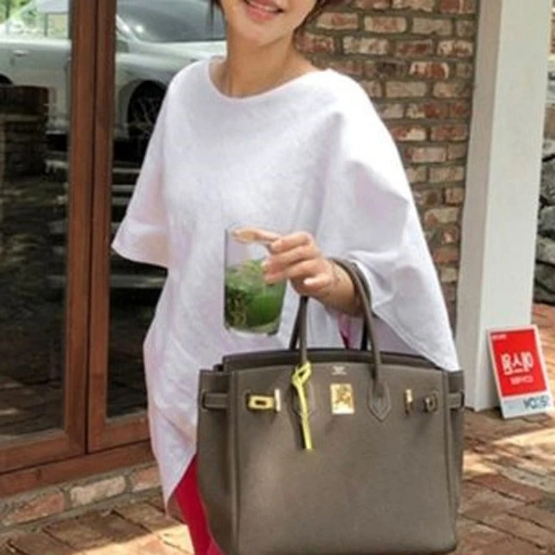 Asymmetrische blouse met halve mouwen voor dames