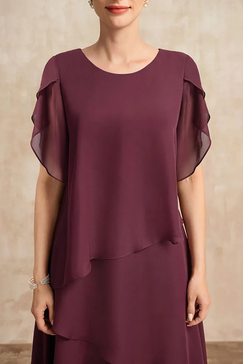 Dames gelaagde chiffonjurk in grote maten