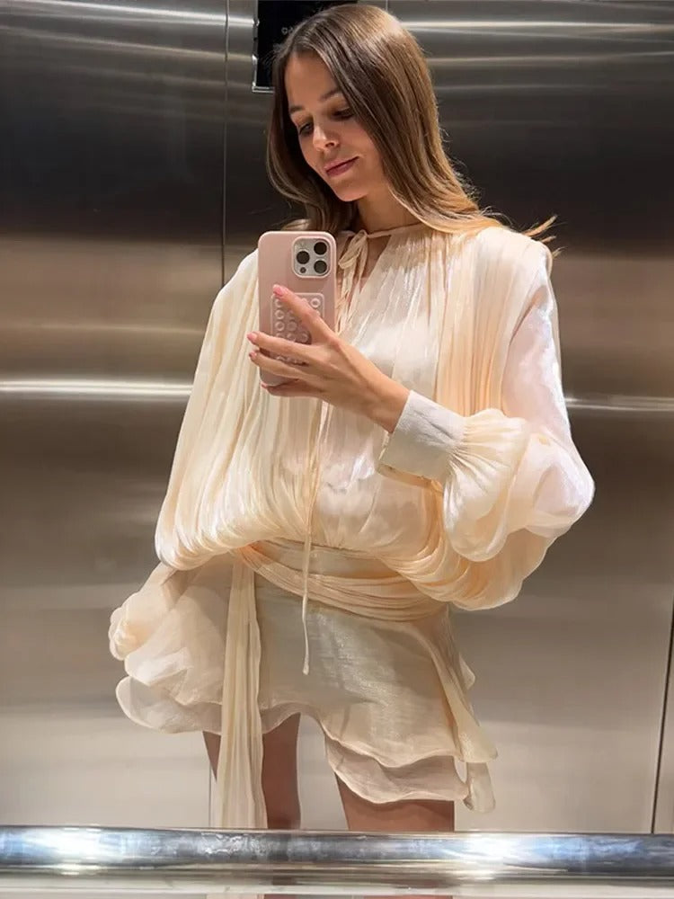 Dames blousejurk met vetersluiting en lantaarnmouwen