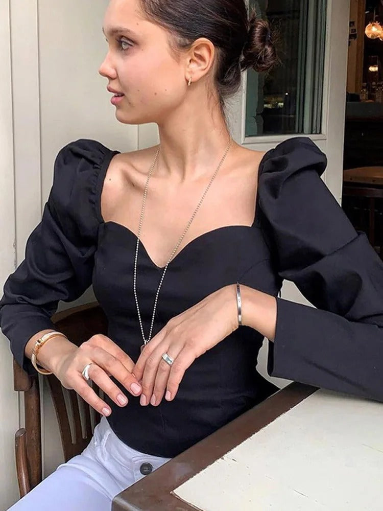 Slanke damesblouse met pofmouwen