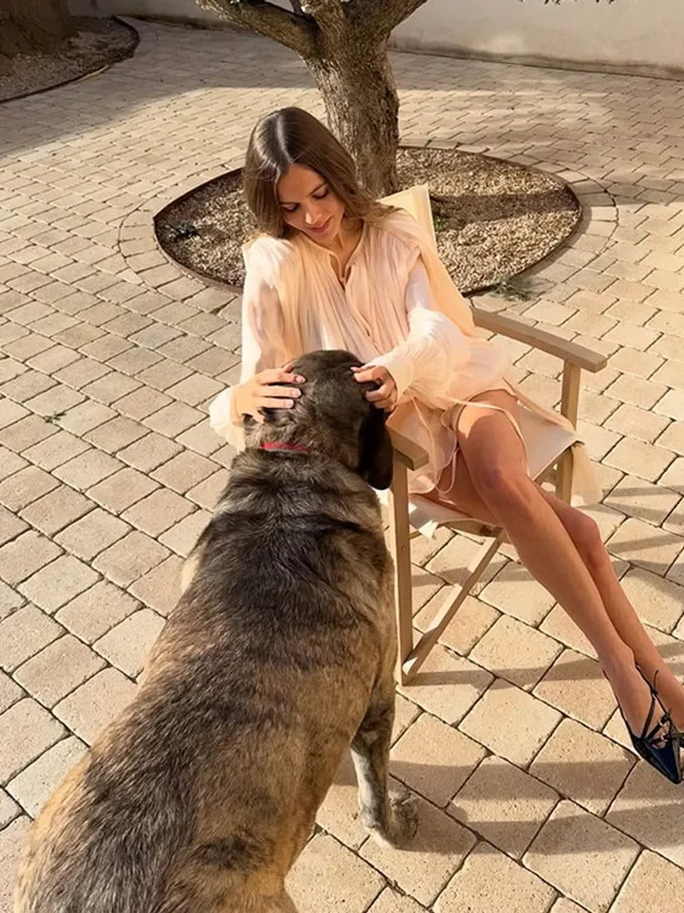 Dames blousejurk met vetersluiting en lantaarnmouwen