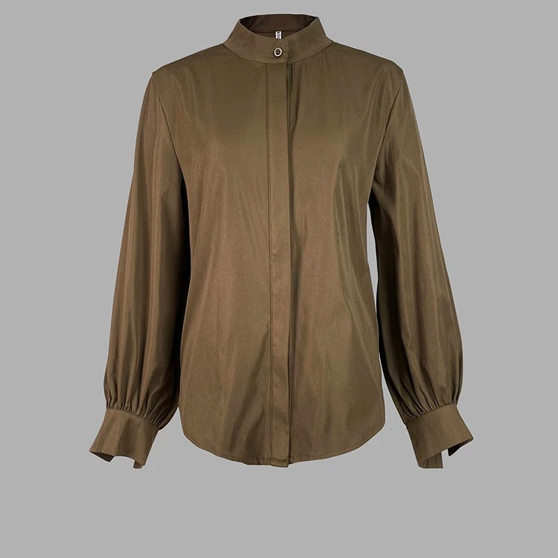 Damesblouse met knoopjes en pofmouwen