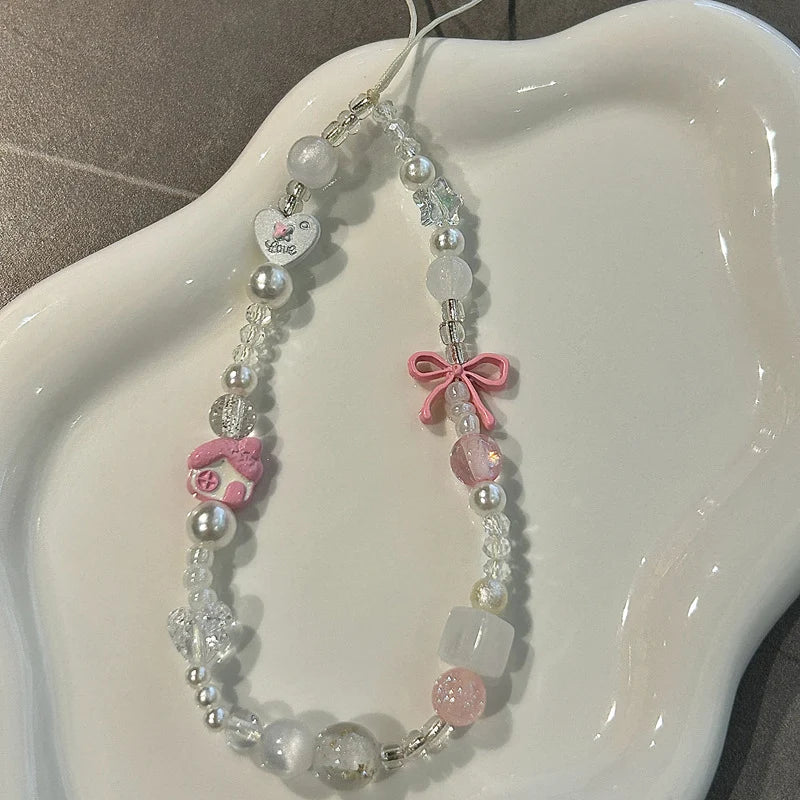 Dames Kralenketting Met Bedeltjes En Strik Detail 1