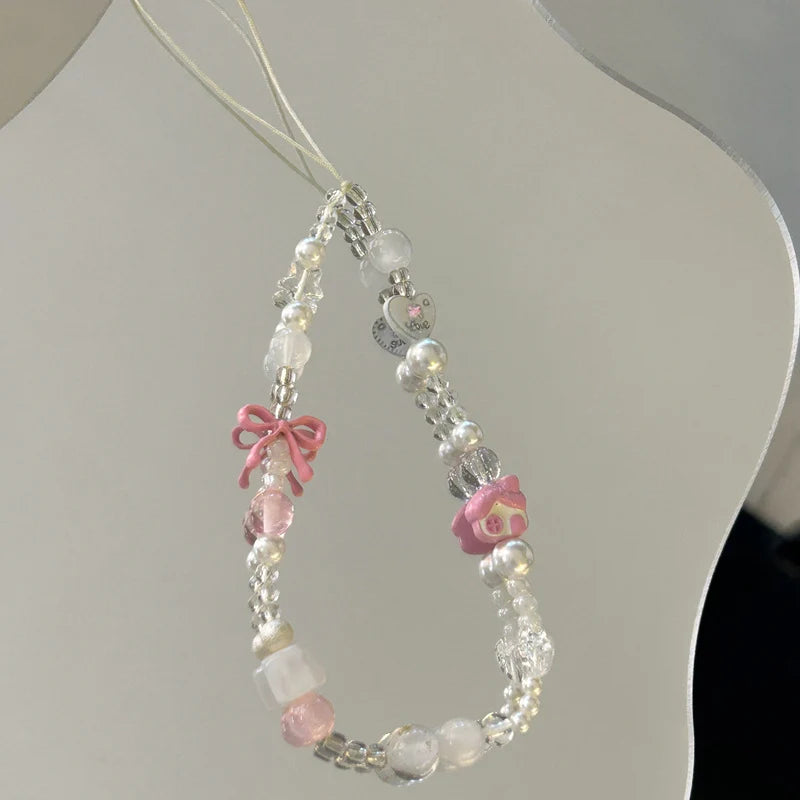 Dames Kralenketting Met Bedeltjes En Strik Detail 2