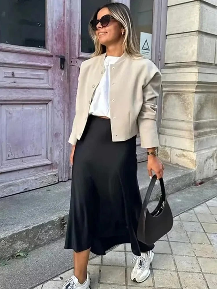 Vrouwen vloeiende satijnen midi-rok